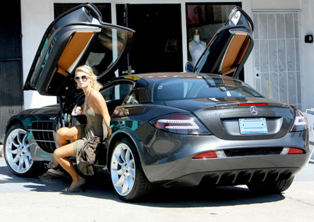 Paris Hilton out of car
