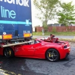 Car photo of the day: Ferrari kissed truck ass