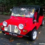 Red Mini Moke That Looks Spicy